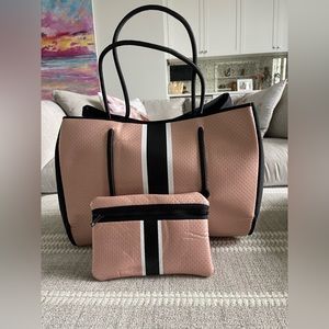 Haute Shore Greyson neoprene tote with matching wristlet.